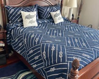 Tommy Bahama queen bed.