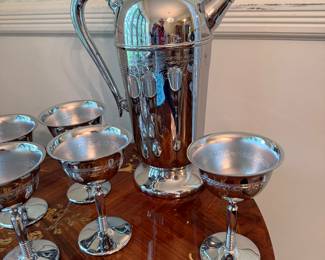 Vintage chrome cocktail shaker with glasses