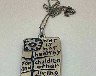 War is not healthy for children and other living things pendant (1968)