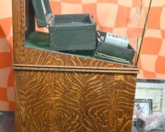 Display case with barber kit inside