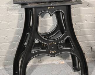 Modern Cast Iron Table Bases by Bear Hollow Supply
These two substantial cast iron bases are a modern reproduction by Bear Hollow Supply, modeled after vintage industrial machinery supports. Finished in black enamel and marked “Made in USA,” they are ideal for makers, designers, or anyone seeking a strong, architectural foundation for a custom table or workbench. Style meets substance in this beautifully built piece of modern craftsmanship.