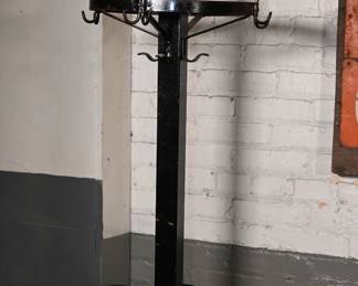 Vintage Industrial Rotating Metal Coat Rack. Functional and structurally sound, with desirable surface wear and oxidation typical for its age and usage. No visible repairs or modifications detracting from original character.