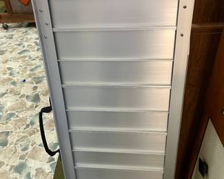Ramp folds up and has handle -rated for 600 pounds