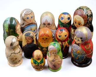 A Dozen Hand Painted Russian Nesting Dolls, 12 Pieces