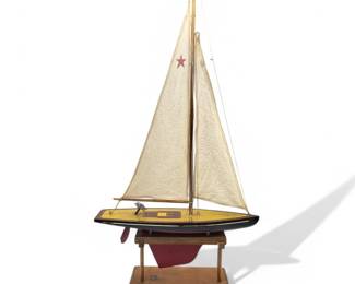 A Fine Wood Carved USA Model Sailboat