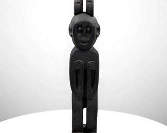 A Unique African Carved Wood Male Tribal Figure With Zoomorphic Creatures