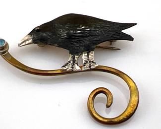 Raven sterling, brass and opal brooch, signed Courtney