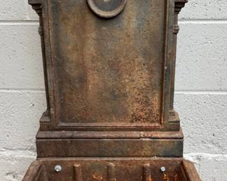 Cast iron ornamental wall mounted planter