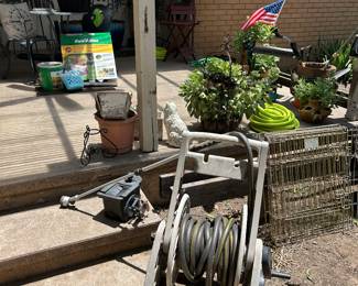 Potted plants, strawberry and herb planters, Rain Bird irrigation system 