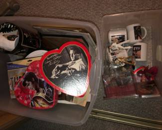 Elvis collectibles. Cups, tins, candy boxes.