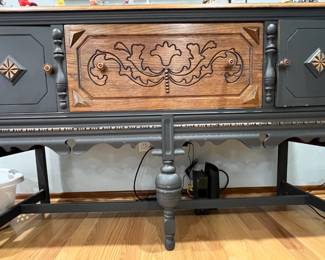 Unique solid wood ornate buffet with glass protective covering (approx 30x50inches)