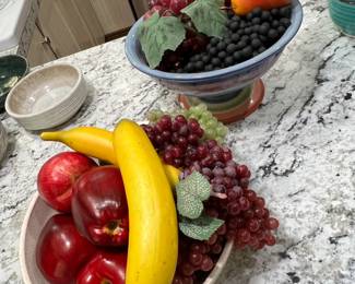 Faux fruit in beautiful bowls