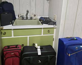 Traveling Gear -- backpacks / storage / varying sizes of suitcases