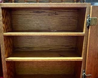 Inside of wooden cabinet...