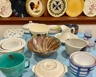 Decorative plates and bowls and serving dishes abound