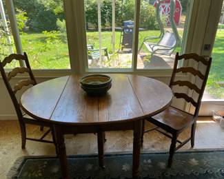 Solid wood dropleaf table with 4 matching chairs 