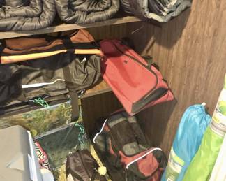 Sleeping bags, carryall bags, tent and chairs and umbrella too