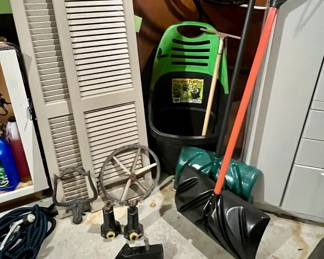 Four composite shutters, snow shovels and wheeled garden gear tote