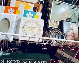 Assortment of small decorative frames and messages