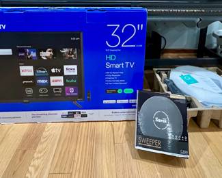 NEW Smart TV and robo sweeper and a small robo too