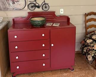 Solid red buffet w/4 drawers and large door compartment perfect for use in many rooms  - metal bike wall hanging and driftwood painted Welcome hanging
