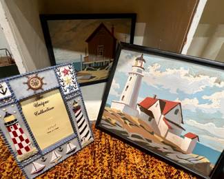 Numerous nautical frames and prints through the home