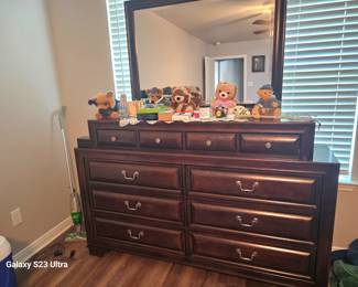 beautiful dresser with mirror and storage, matches night stands and bed