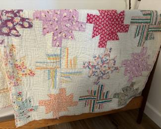 Colorful Patchwork Quilt with Tides or Pinwheel-like Blocks
