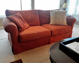 Pair of Matching Red & White Striped Love Seats