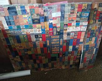 Piece of Dry Wall Covered in Vintage Matchbooks