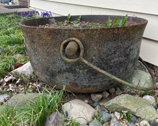 Very large cast iron cauldron. No holes. Empty.