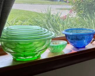Sets of depression glass bowls.