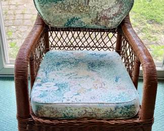 Set of four rattan chairs. Never outside. Pads match glass table furniture. 