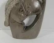 159 Loving Couple carved in Fruit Serpentine. SIGNED Farai Tendai fro