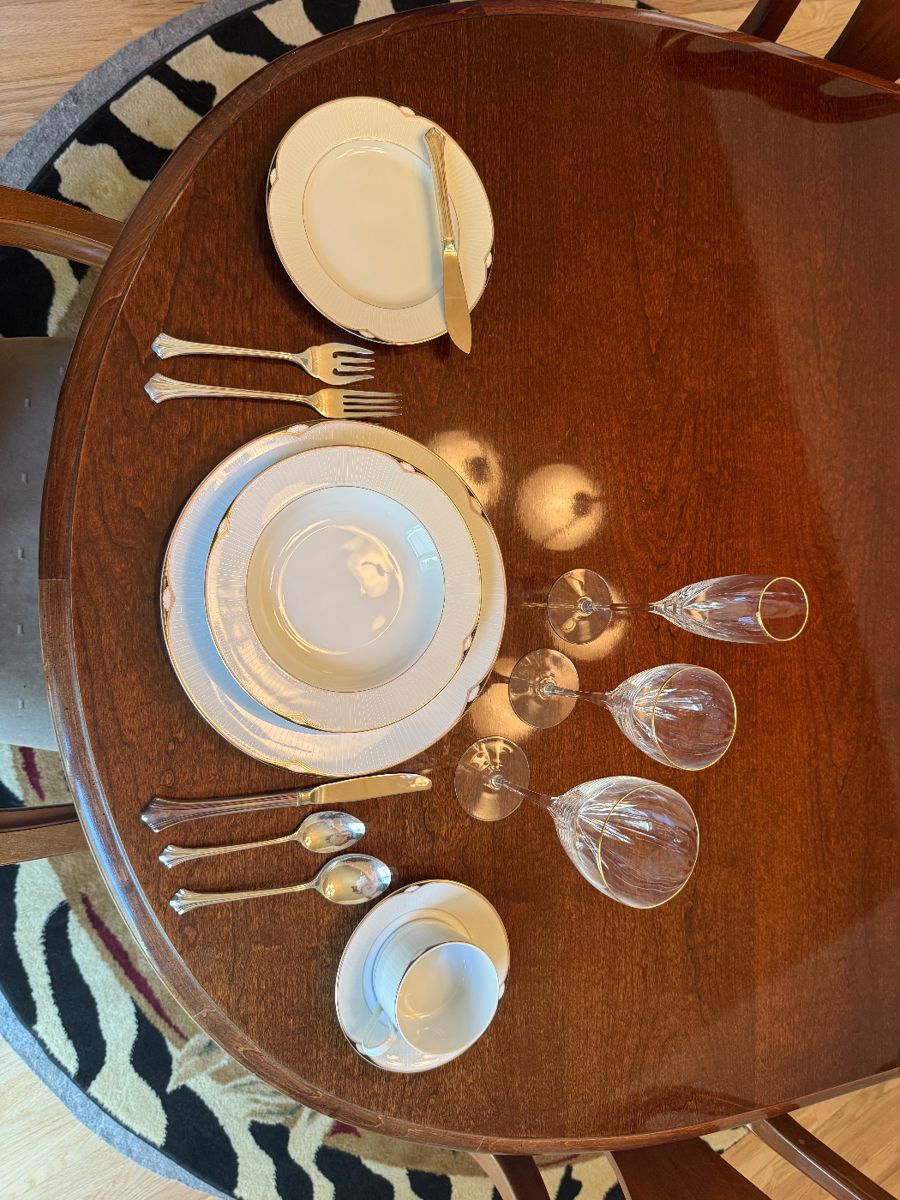 $500 for all, willing to split/break.
China and crystal set of 12 of:
Red wine glass
White wine glass
Champagne glass
Coffee cup and saucer
Salad bowl
Bread plate
Dinner plate
Salad fork
Dinner fork
Dinner knife
Bread knife
Soup spoon
Teaspoon
Not pictured:
Serving bowls, platter, and utensils
Butter dish, sugar dish, gravy boat, and salt + pepper shaker
Christmas butter knives, butter dish, and sugar dish