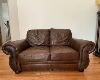Brown leather love seat
$100