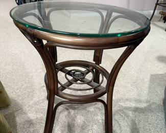 Wood side table with glass top
$20