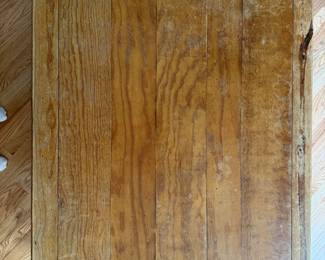 Light brown wood top of coffee table