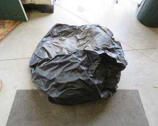 Lot 402. Grill cover with adjustable straps