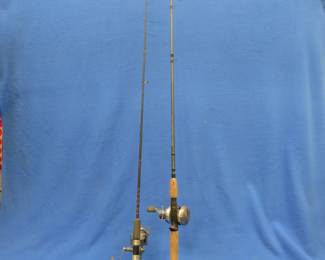 Lot 142. Guide Series GX 56 bait casting reel on 6' 6" medium heavy IM 8 graphite rod. Shimano 1000 RB Sidestab spinning reel on a 5' 6" ultralight rod.