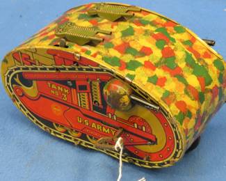 Lot 335. 1930's Marx US Army Tank No.3 wind-up tin lithograph toy. Winds up and appears complete but the spring needs a little fine-tuning.