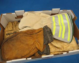 Lot 422. A box of leather gloves and mittens