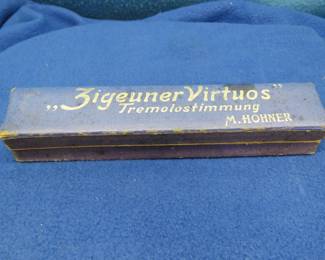 Lot 81. Hohner Zigeuner Virtuos 48-reed tremolo harmonica in the key of C Sounds great. Box in VGC