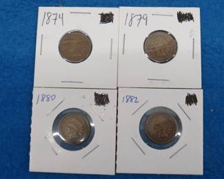 Lot 61. Four Indian head pennies. 1874, 1879, 1880, and 1882.