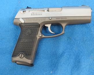 Lot 417. Ruger P94DAO semi-auto pistol. 9mm x 19. SN 308-34442. Includes hard case, manual, two magazines, and a speed loader.
