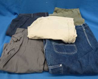 Lot 257. Five pairs of pants. See photos for sizes