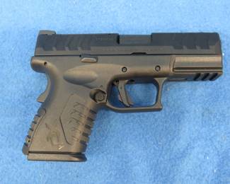 Lot 416. Springfield Armory XDM Elite 45 ACP semi-auto pistol. SN BF296085. Seller says it's never been shot. Manual, one magazine, and original factory box.