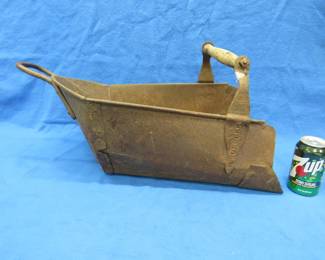 Lot 30. Primitive Hercules grain scoop