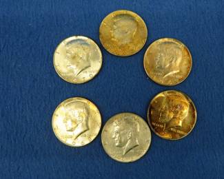 Lot 279. Six 40% silver Kennedy half-dollars