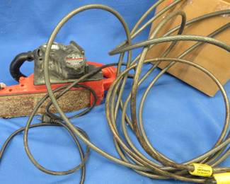 Lot 266. Black & Decker belt sander that powered up and a long cable lock